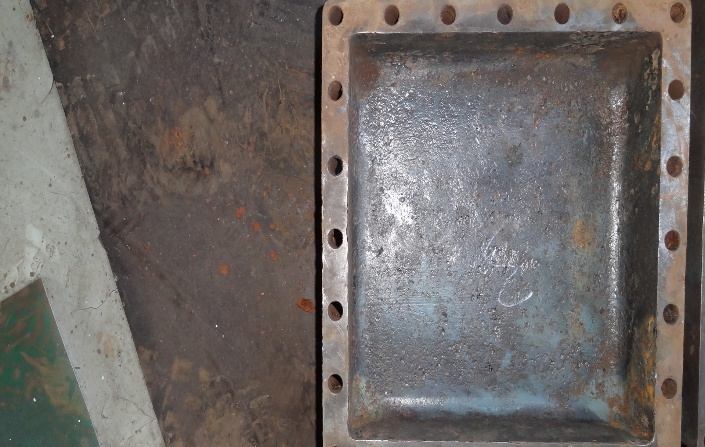 IHI TRE60 cooler end cover after grinding — clean metal