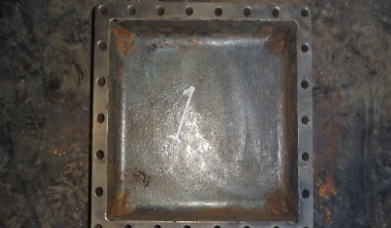 IHI TRE60 cooler end cover after grinding — bright surface