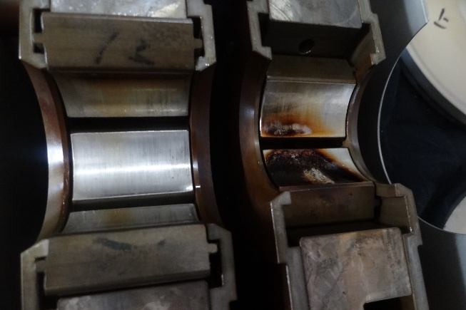 IHI TX-A 1st-stage bearing pad with carbon deposits