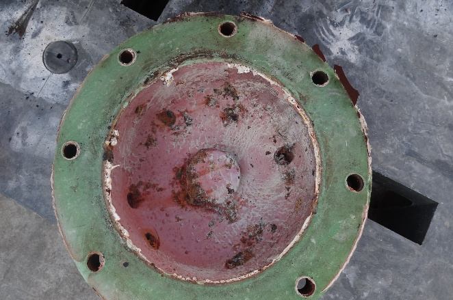 IHI TX-A oil cooler rear end cover before grinding — rusty