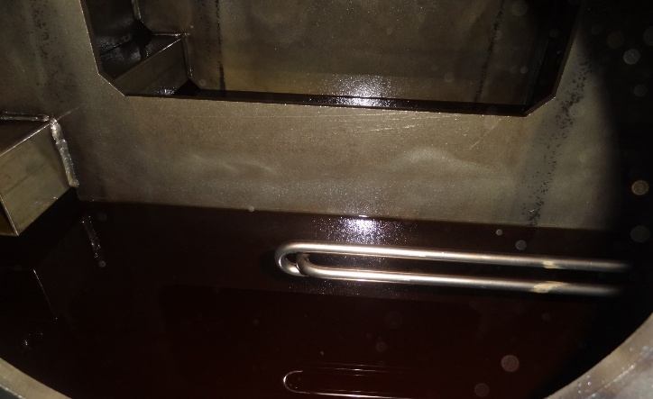IHI TX-A oil tank with discolored aged oil