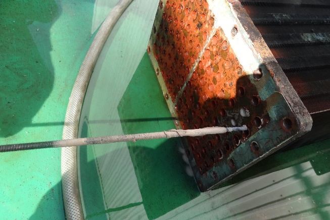 IHI TX-A cooler copper tube blocked — drilled through to clear