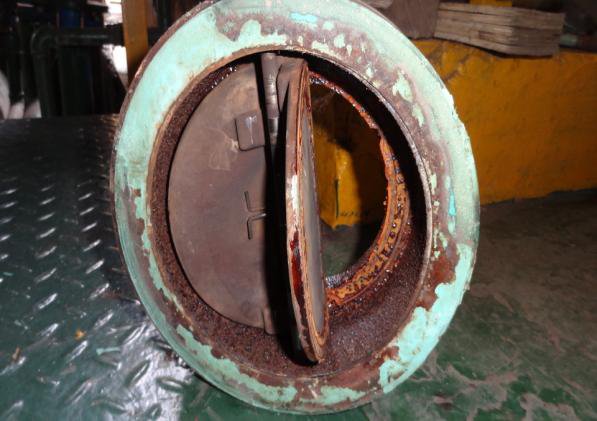 IHI TRA350KW discharge check valve as found, valve plate damaged