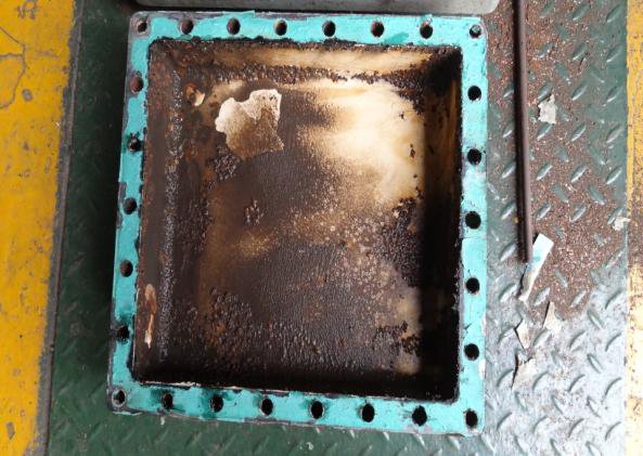IHI TRA350KW 1st stage intercooler rear end cover as found with heavy scale