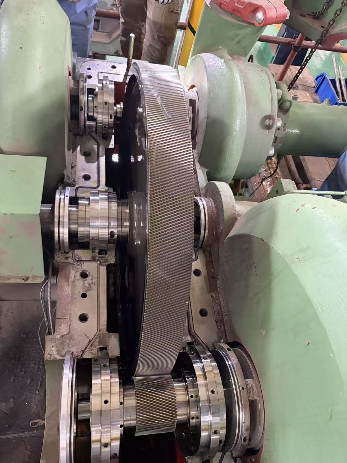Ingersoll Rand / Cameron MSG compressor overhaul — bull gear and pinion shafts exposed inside the opened gearbox