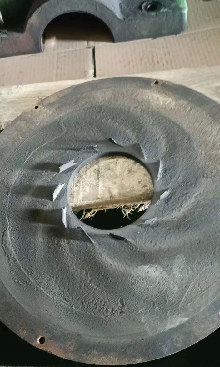 Cameron TA6000 overhaul — worn diffuser plate with fouled and corroded vane passages