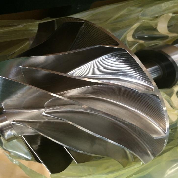 Healthy centrifugal compressor impeller with uniform blade profile and clean machined surfaces